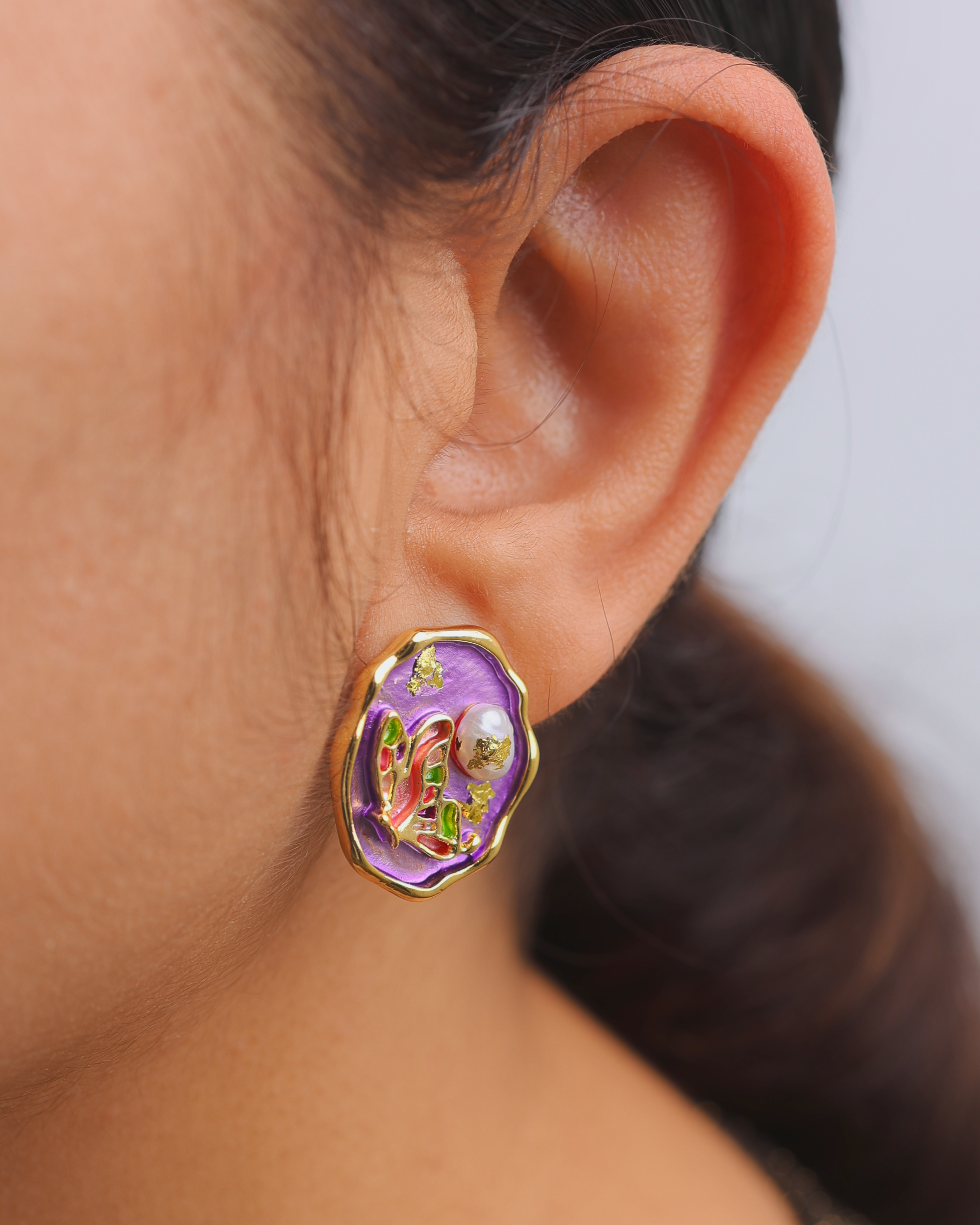 Butterfly in Purple Pearl Ear Studs hover